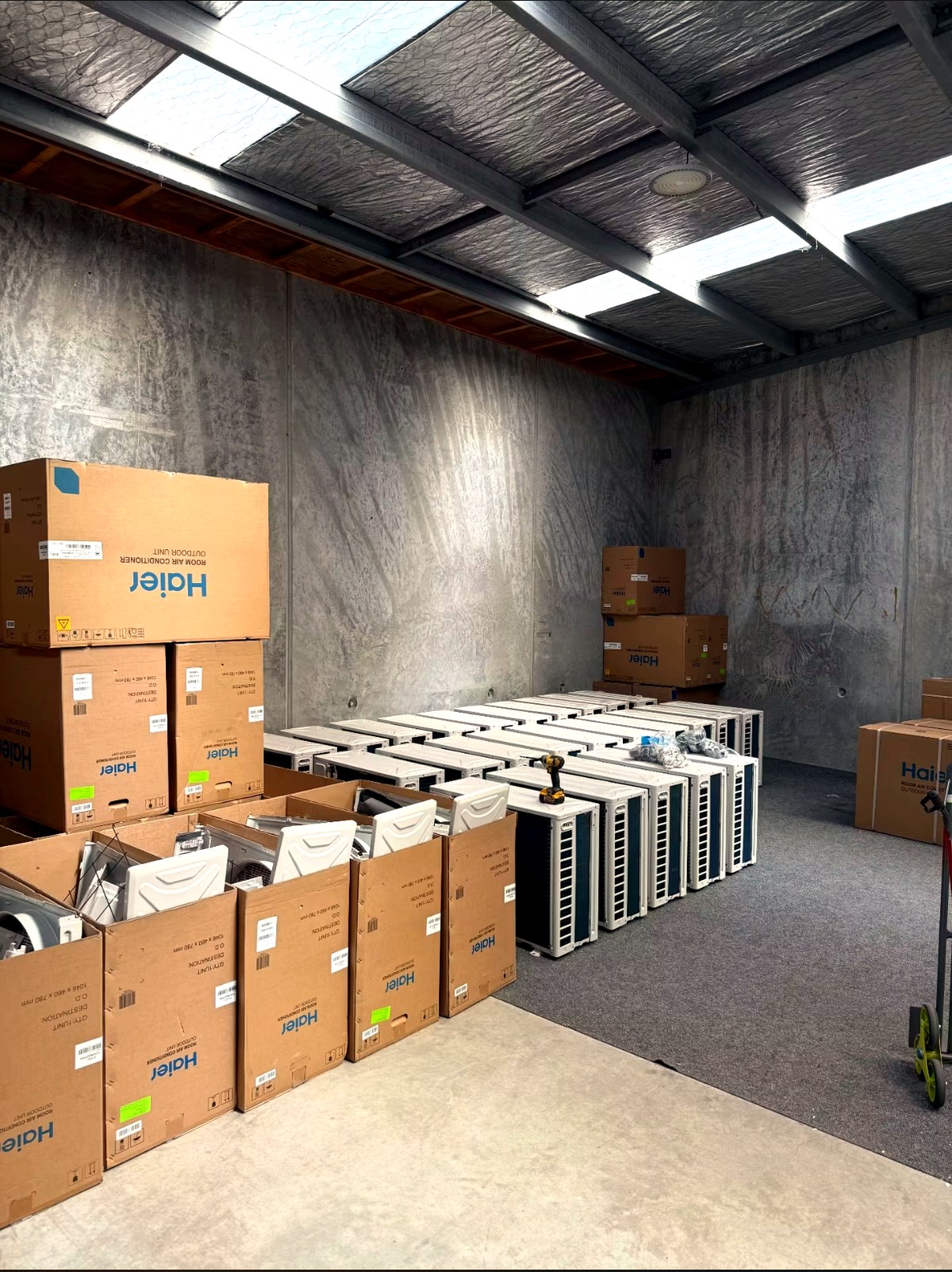 Large commercial Haier heat pump installation by Hepburn Electrical
